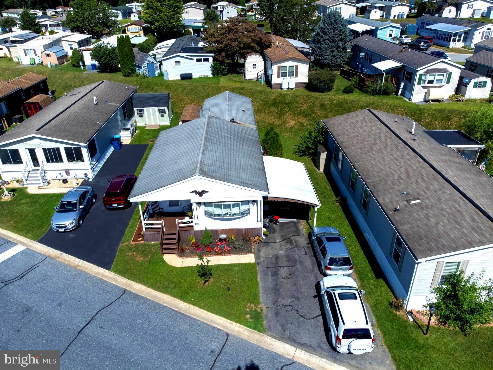 77 Ridgewood Manor Manheim, PA 17545 - Photo 32 of 36 an aerial view of multiple houses with yard