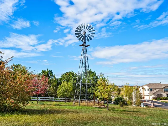 a front view of a building with garden