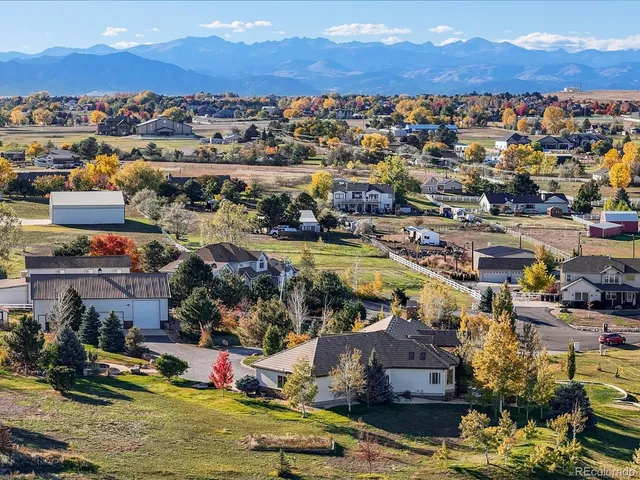 a view of a city with mountains