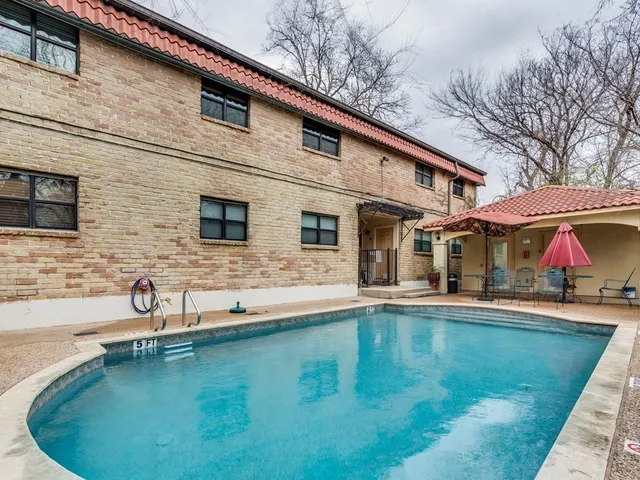 a view of a house with swimming pool