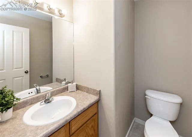 a spacious bedroom with a bed and a window