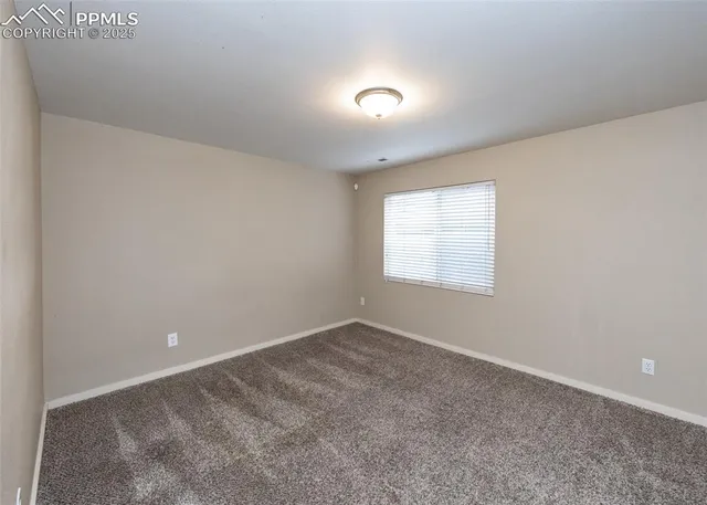 an empty room with an entryway