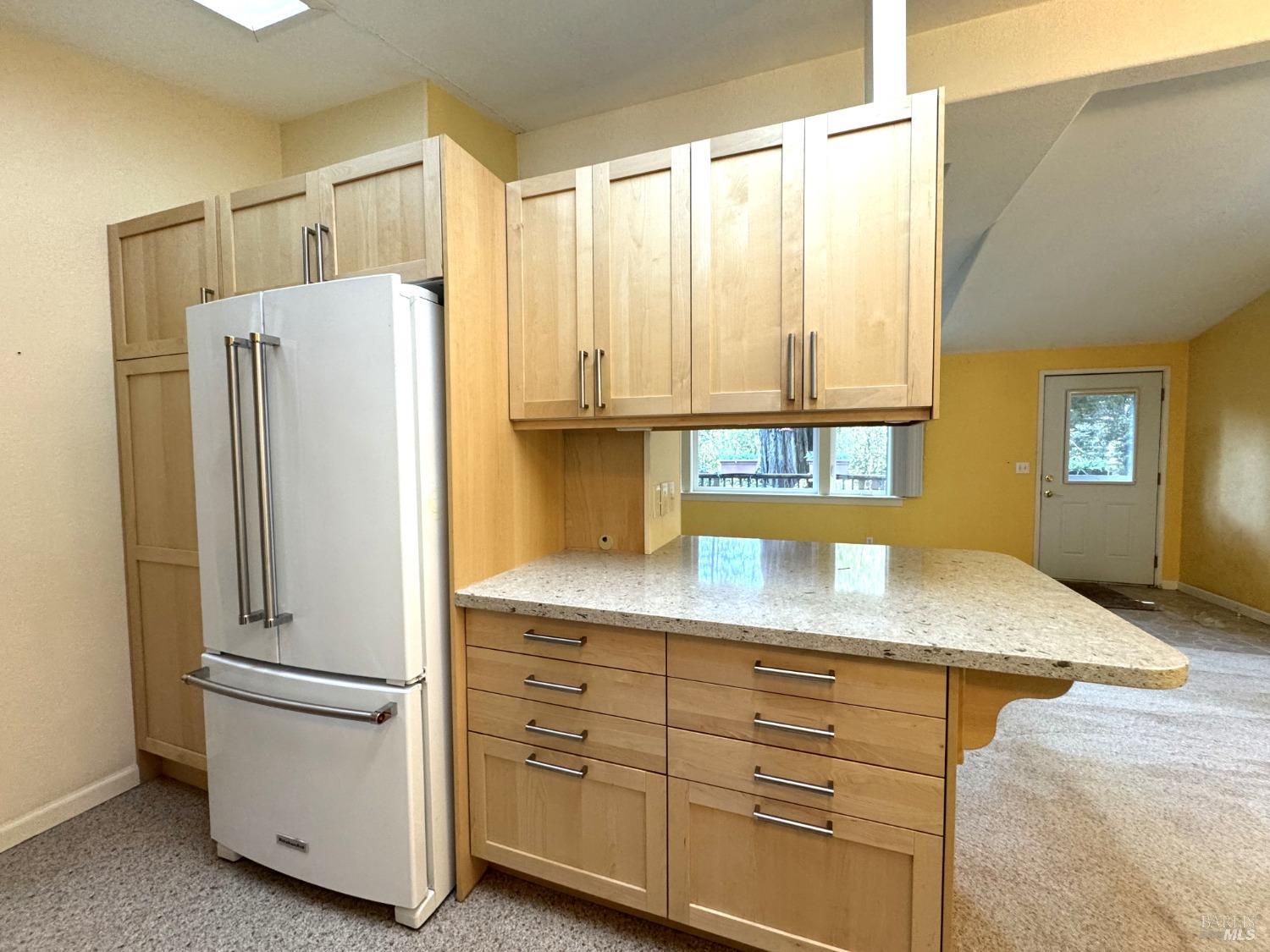 43300 Little River-Airport Road, Unit 35 Little River, CA 95456 - Photo 11 of 23 a kitchen with appliances cabinets and a sink