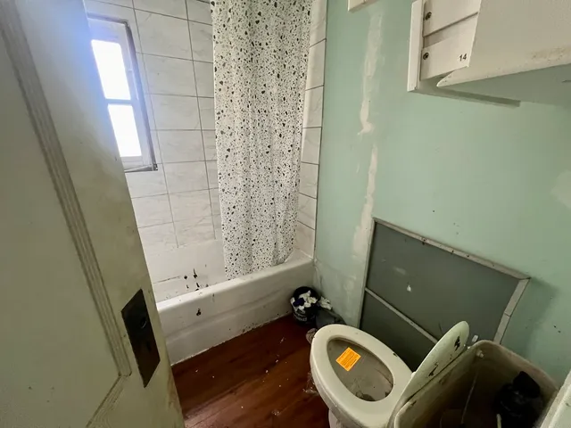 a bathroom with a sink and a window