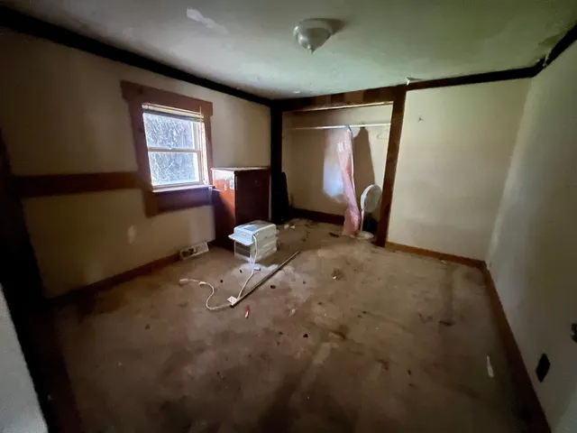 a room with furniture and a window