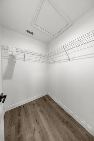 a view of a room with racks on the wall