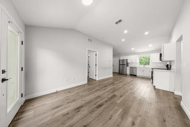 a view of kitchen with wooden floor