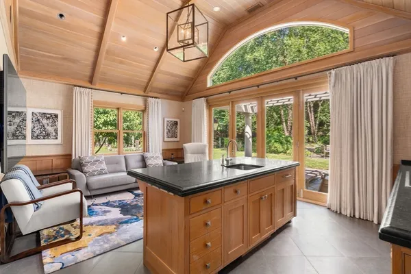 a view of a kitchen with furniture and window