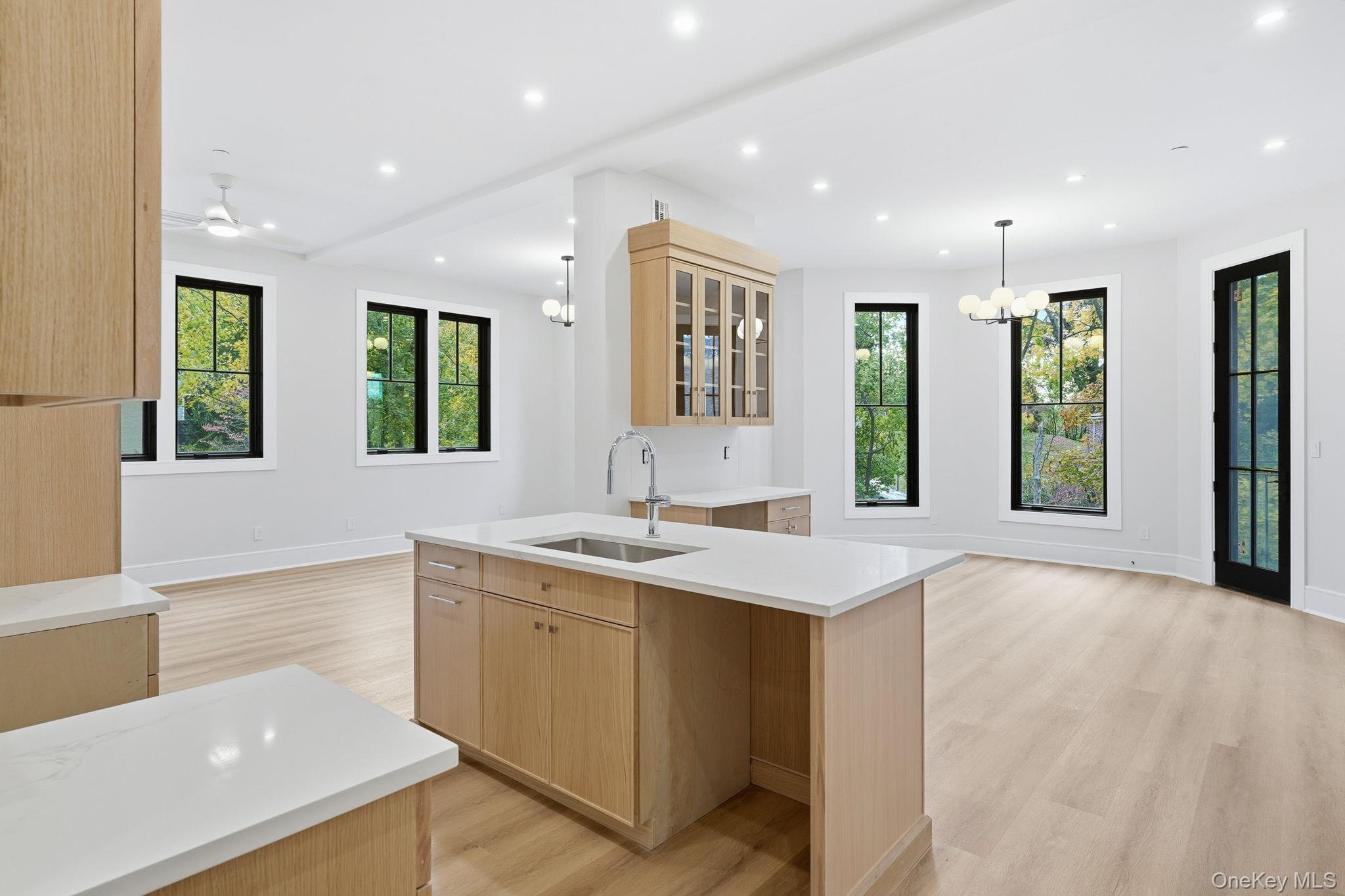 34 Clinton Avenue, Unit 5D Dobbs Ferry, NY 10522 - Photo 2 of 13 a view of a big room with kitchen view and windows