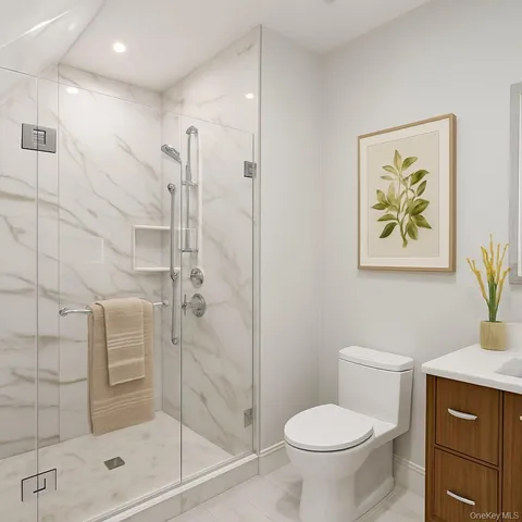 a bathroom with a shower toilet and sink