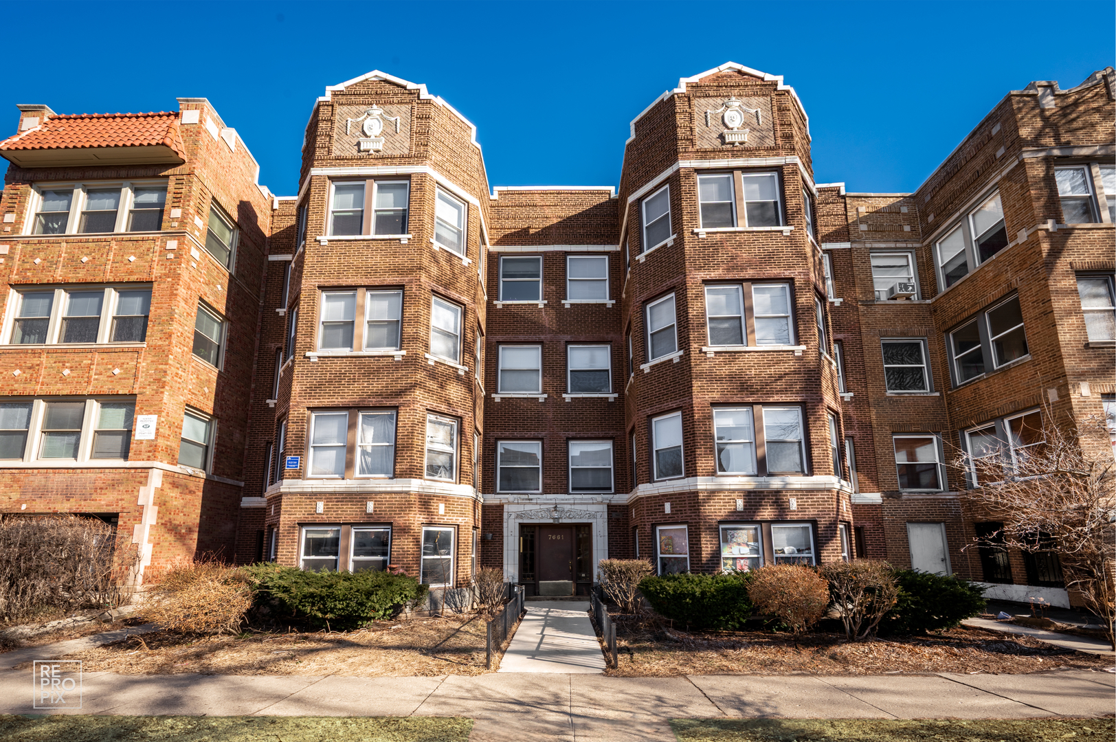 7661 North Sheridan Road Chicago, IL 60626 - Photo 1 of 19 a front view of multi story residential apartment building