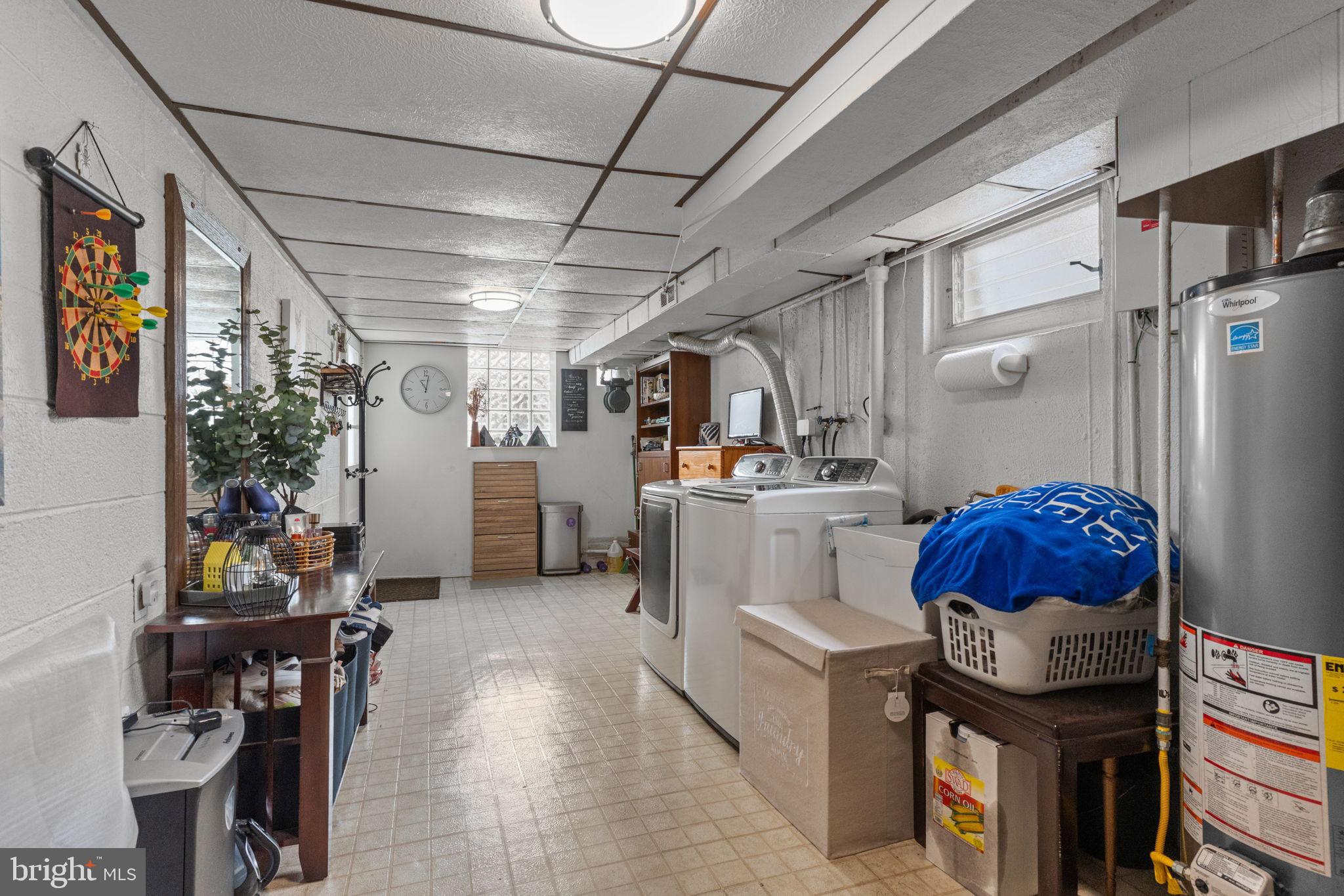 1117 Surrey Road Philadelphia, PA 19115 - Photo 20 of 24 a storage room with washer and dryer