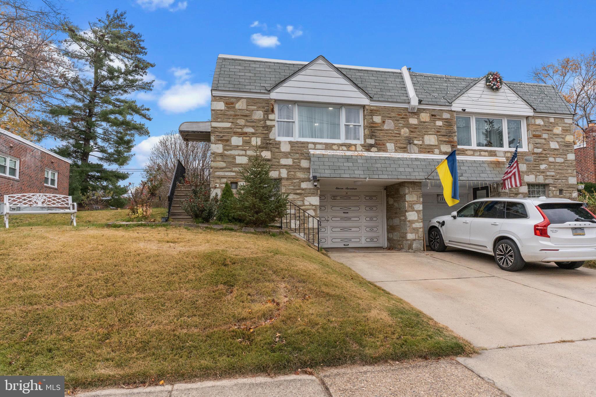 1117 Surrey Road Philadelphia, PA 19115 - Photo 2 of 24 a view of a car park in front of house