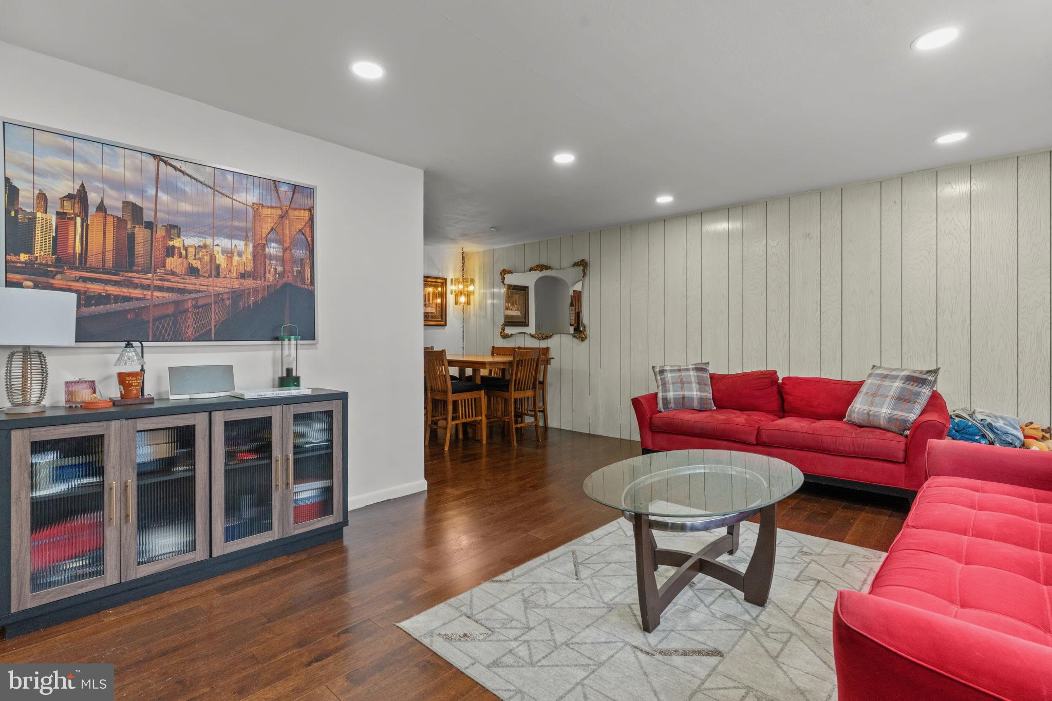 1117 Surrey Road Philadelphia, PA 19115 - Photo 4 of 24 a living room with furniture and a wooden floor