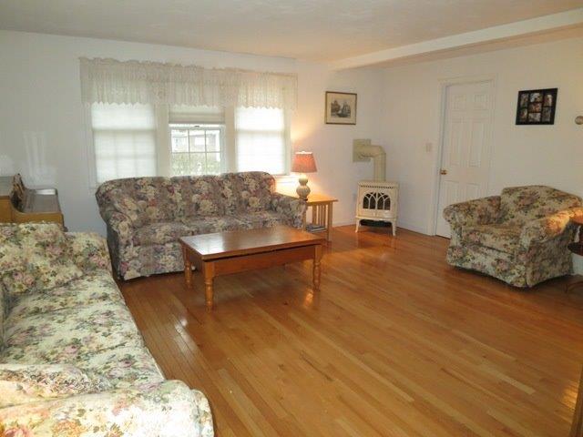 62 Riverside Road Mashpee, MA 02649 - Photo 3 of 13 a living room with furniture and a couch