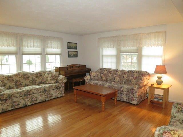 62 Riverside Road Mashpee, MA 02649 - Photo 4 of 13 a living room with furniture and a window