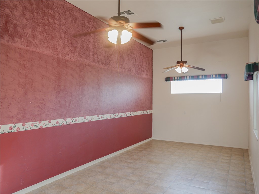 2575 Triangle S Street Kingman, AZ 86401 - Photo 39 of 45 a view of a room with window and chandelier