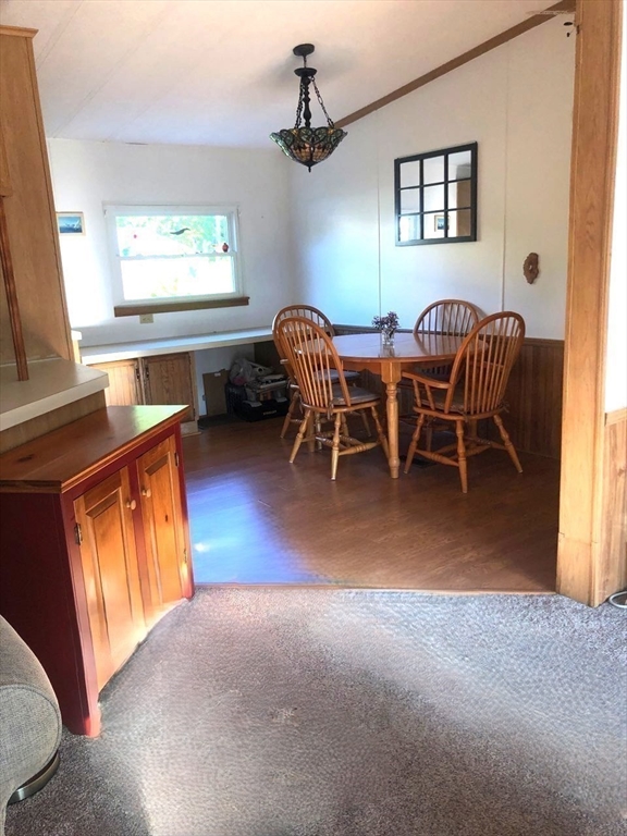 41 Pipers Way Carver, MA 02330 - Photo 10 of 36 a view of a dining room with furniture window and outside view