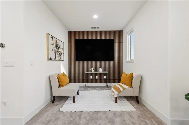 a bathroom with a granite countertop sink a shower and a mirror