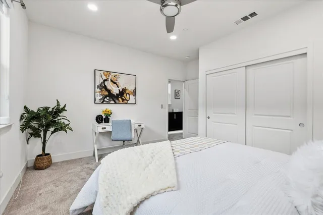 a kitchen with a sink and a washer dryer