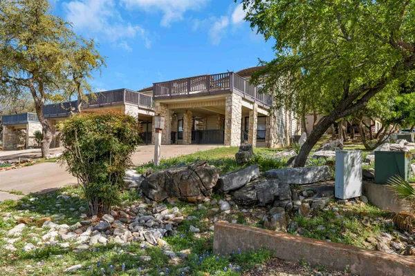 a view of a house with a garden