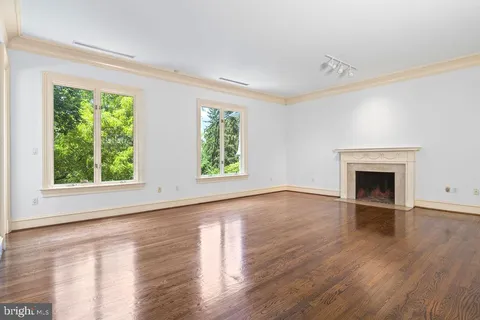 a view of a kitchen with a large window