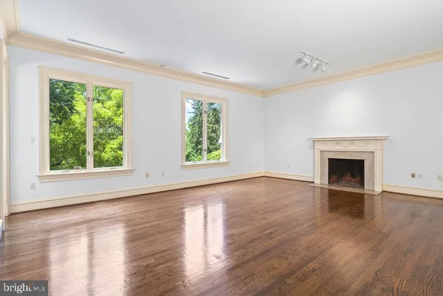 a view of a kitchen with a large window