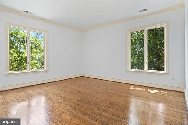 a bathroom with a granite countertop shower sink vanity and toilet