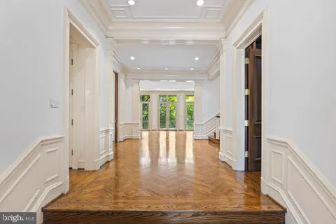 a view of entryway with wooden floor
