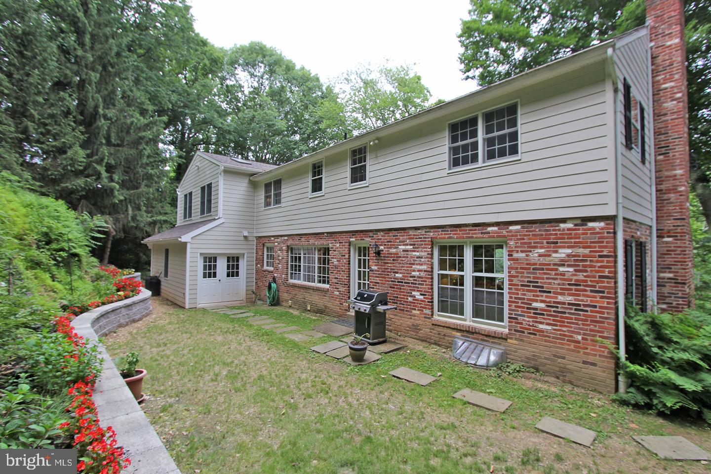 594 Contention Lane Berwyn, PA 19312 - Photo 14 of 15 a view of a house with backyard porch and sitting area
