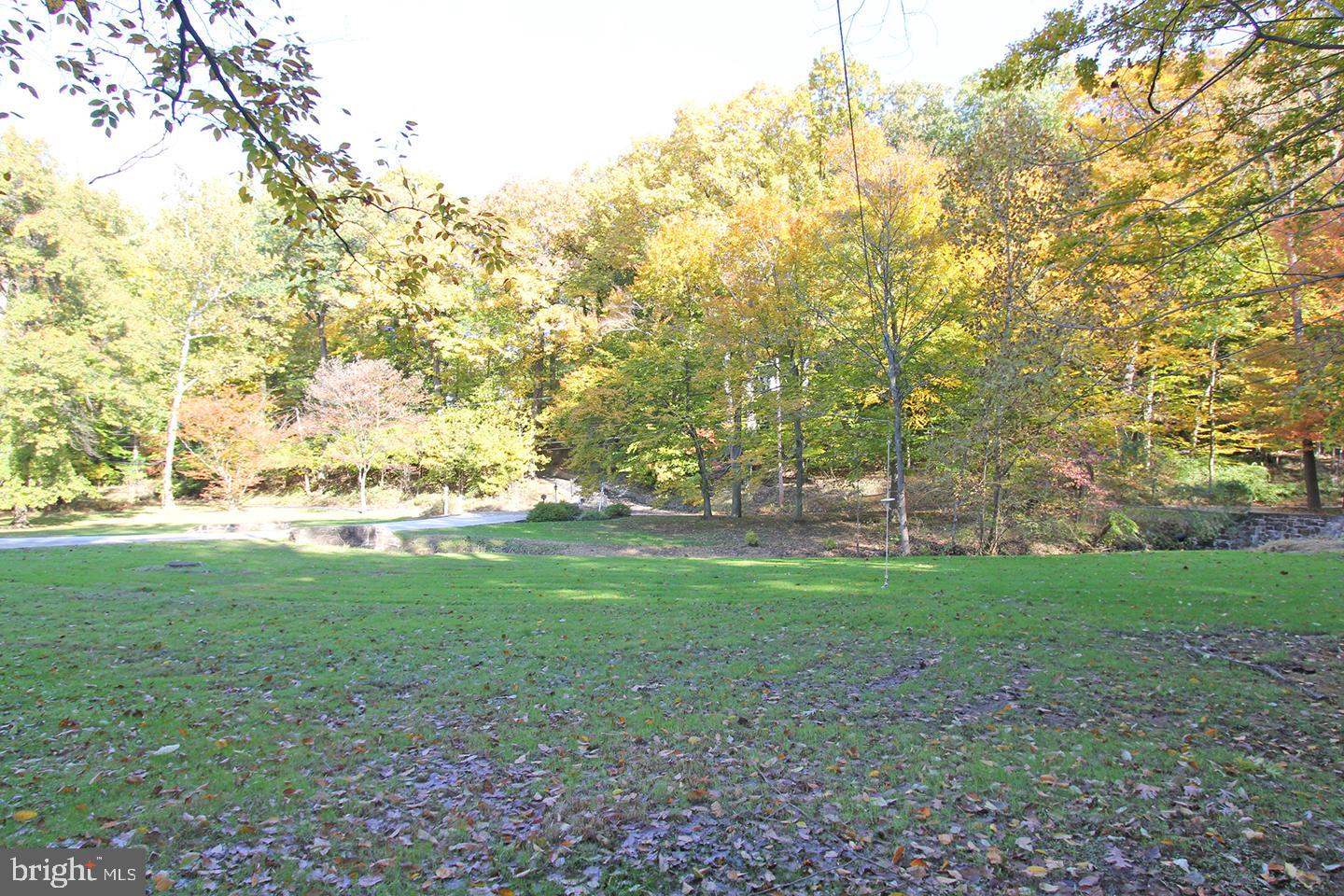 594 Contention Lane Berwyn, PA 19312 - Photo 15 of 15 a view of a field with trees in the background