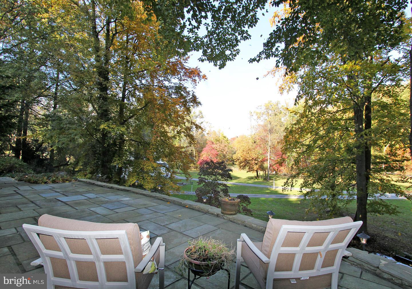 594 Contention Lane Berwyn, PA 19312 - Photo 4 of 15 a view of a chairs and table in the backyard