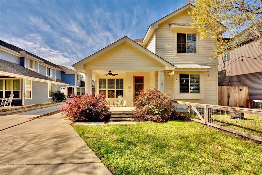 View of front of home featuring covered porch and ceiling fan