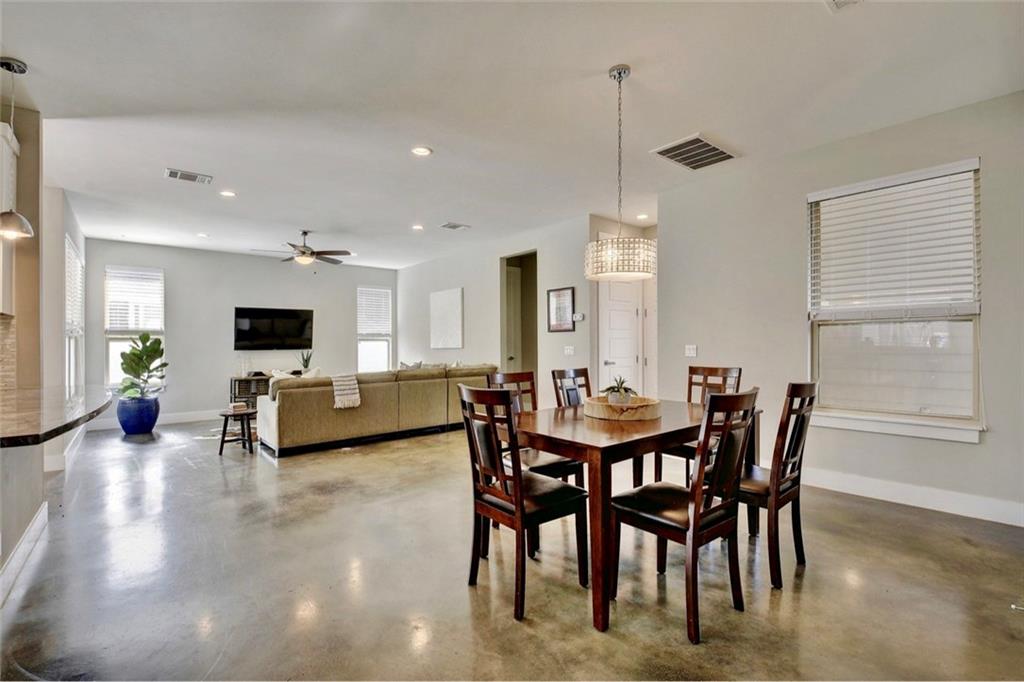 701 East 49th Street, Unit B Austin, TX 78751 - Photo 7 of 27 Dining area with finished concrete floors, ceiling fan, and recessed lighting