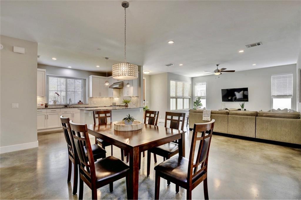 701 East 49th Street, Unit B Austin, TX 78751 - Photo 10 of 27 Dining area with concrete floors, recessed lighting, and ceiling fan