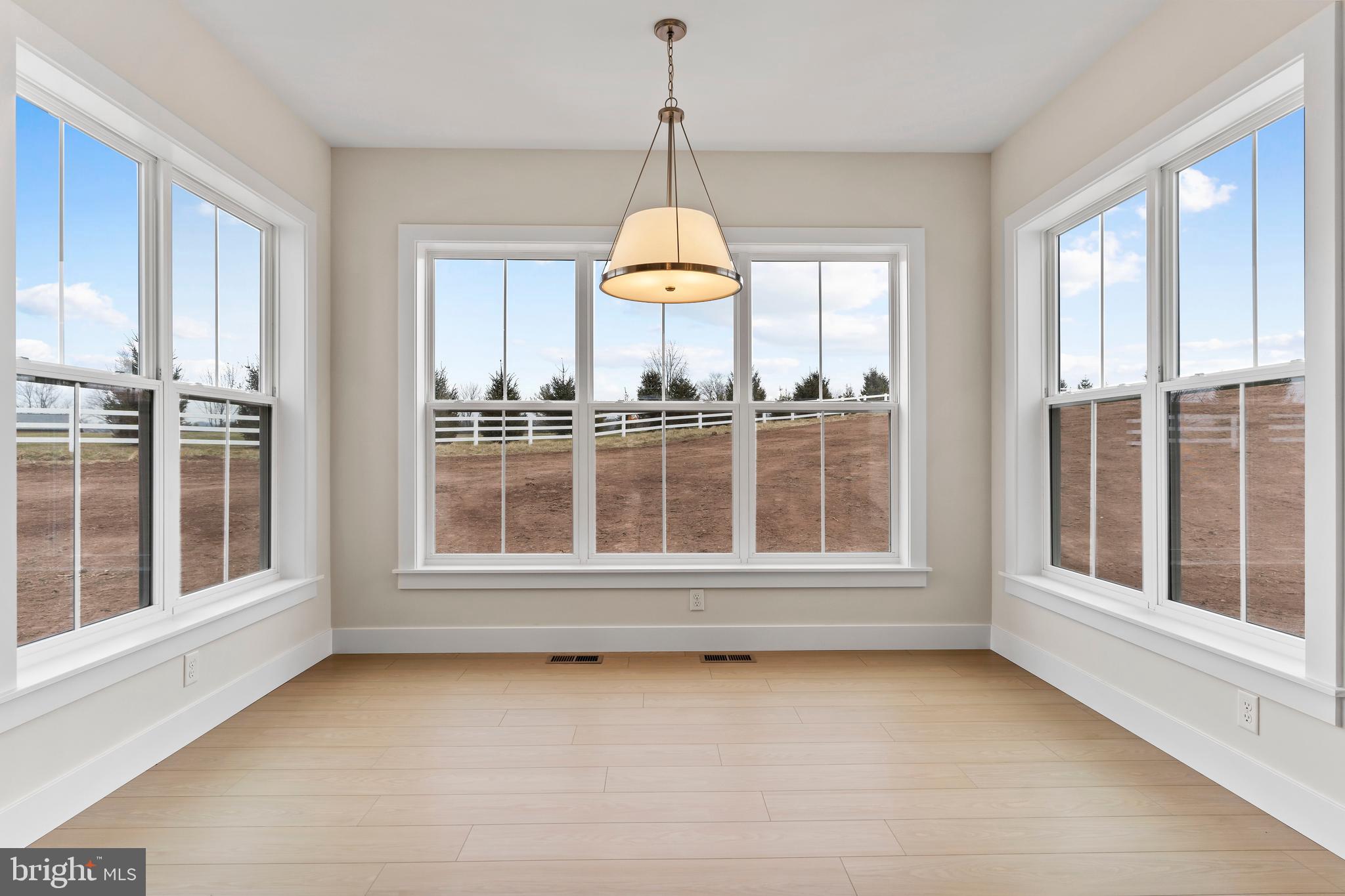302 Cedar Road Dillsburg, PA 17019 - Photo 13 of 54 a view of wooden floor and a window in a room