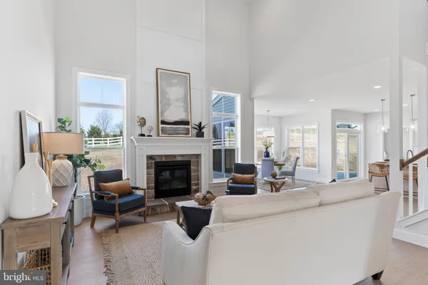 a living room with furniture and a table
