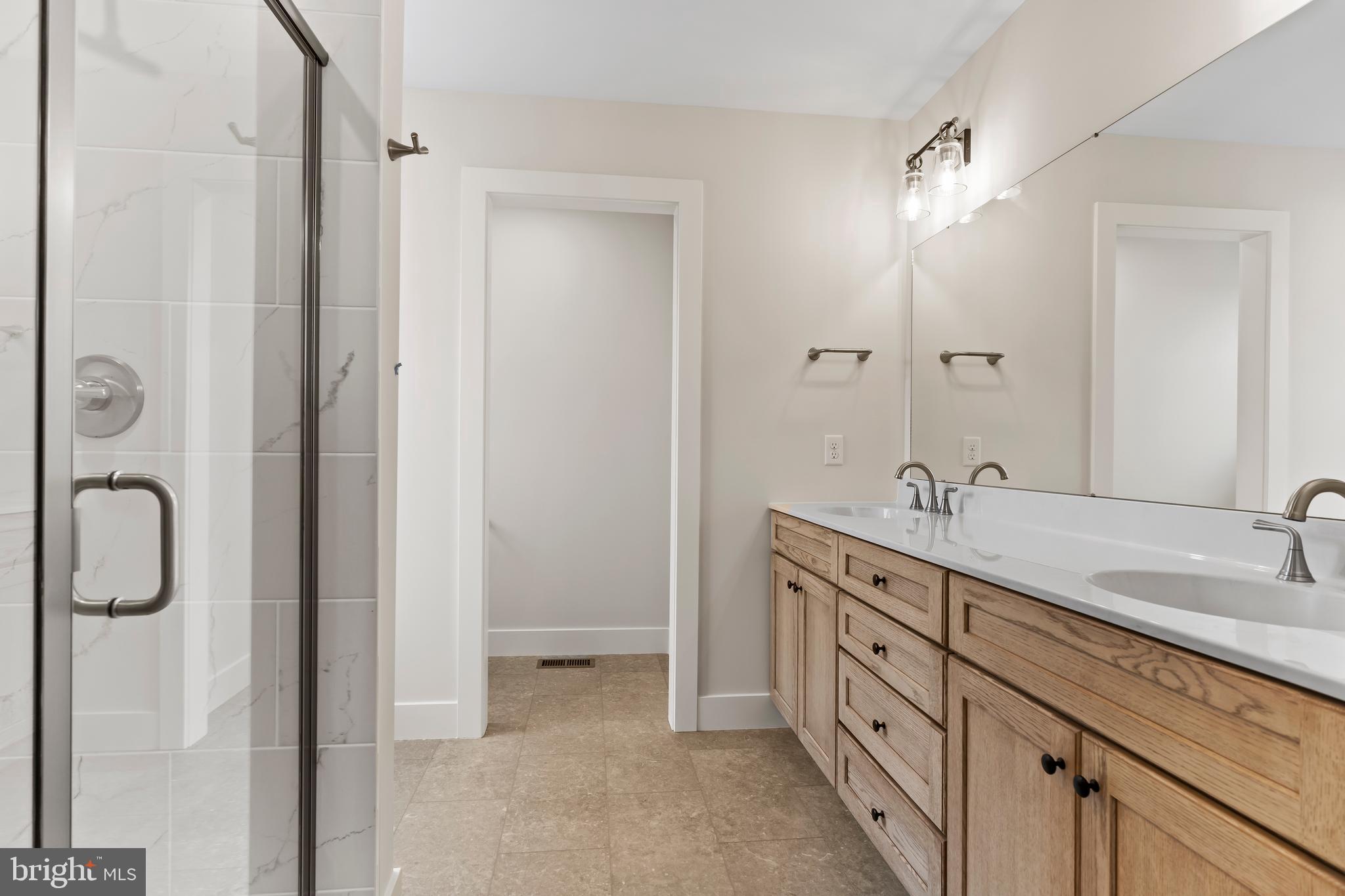 302 Cedar Road Dillsburg, PA 17019 - Photo 32 of 54 a spacious bathroom with a double vanity sink mirror and double