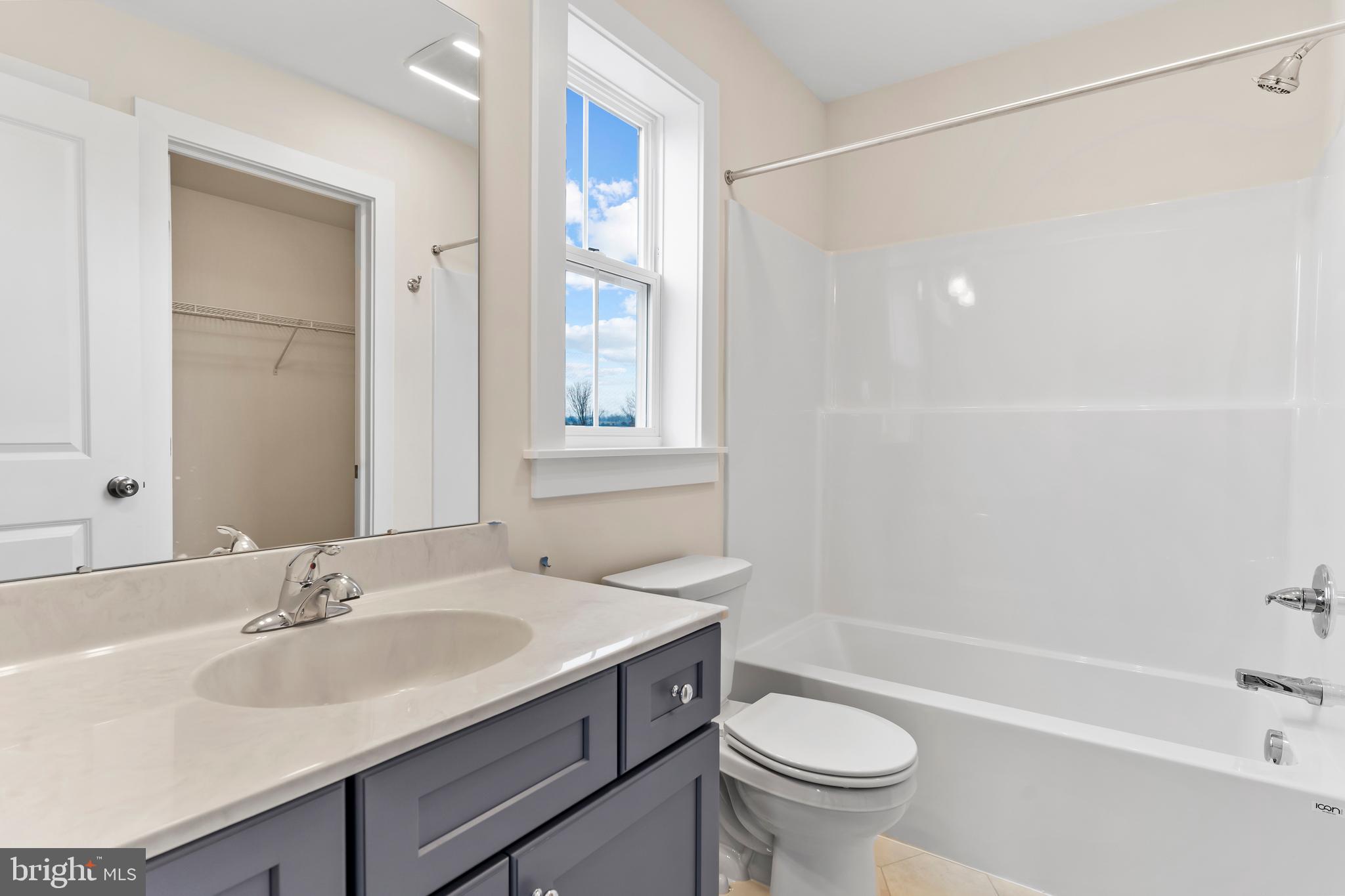 302 Cedar Road Dillsburg, PA 17019 - Photo 40 of 54 a bathroom with a sink a toilet and a bathtub