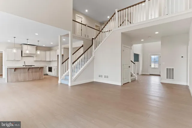 a view of a kitchen with furniture and a window