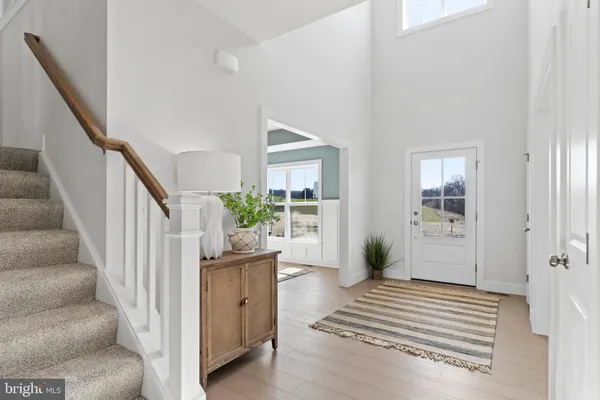 a view of a hallway with staircase