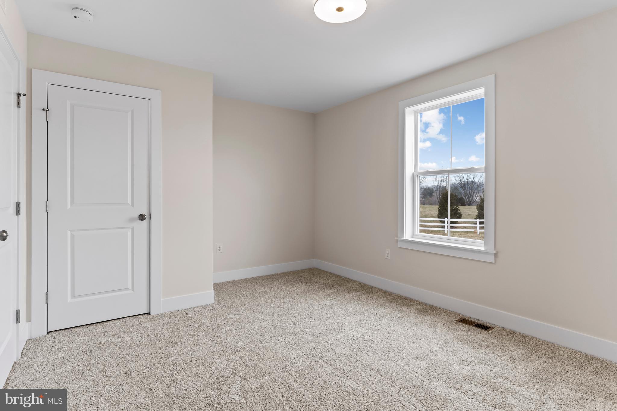 302 Cedar Road Dillsburg, PA 17019 - Photo 45 of 54 a view of an empty room with a window