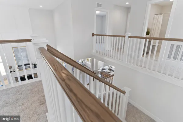 a kitchen with stainless steel appliances granite countertop a stove and a refrigerator