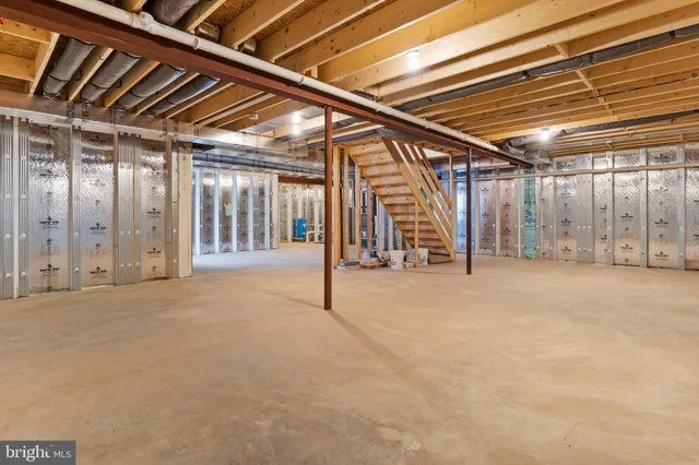 a view of a house with outdoor space and lake view