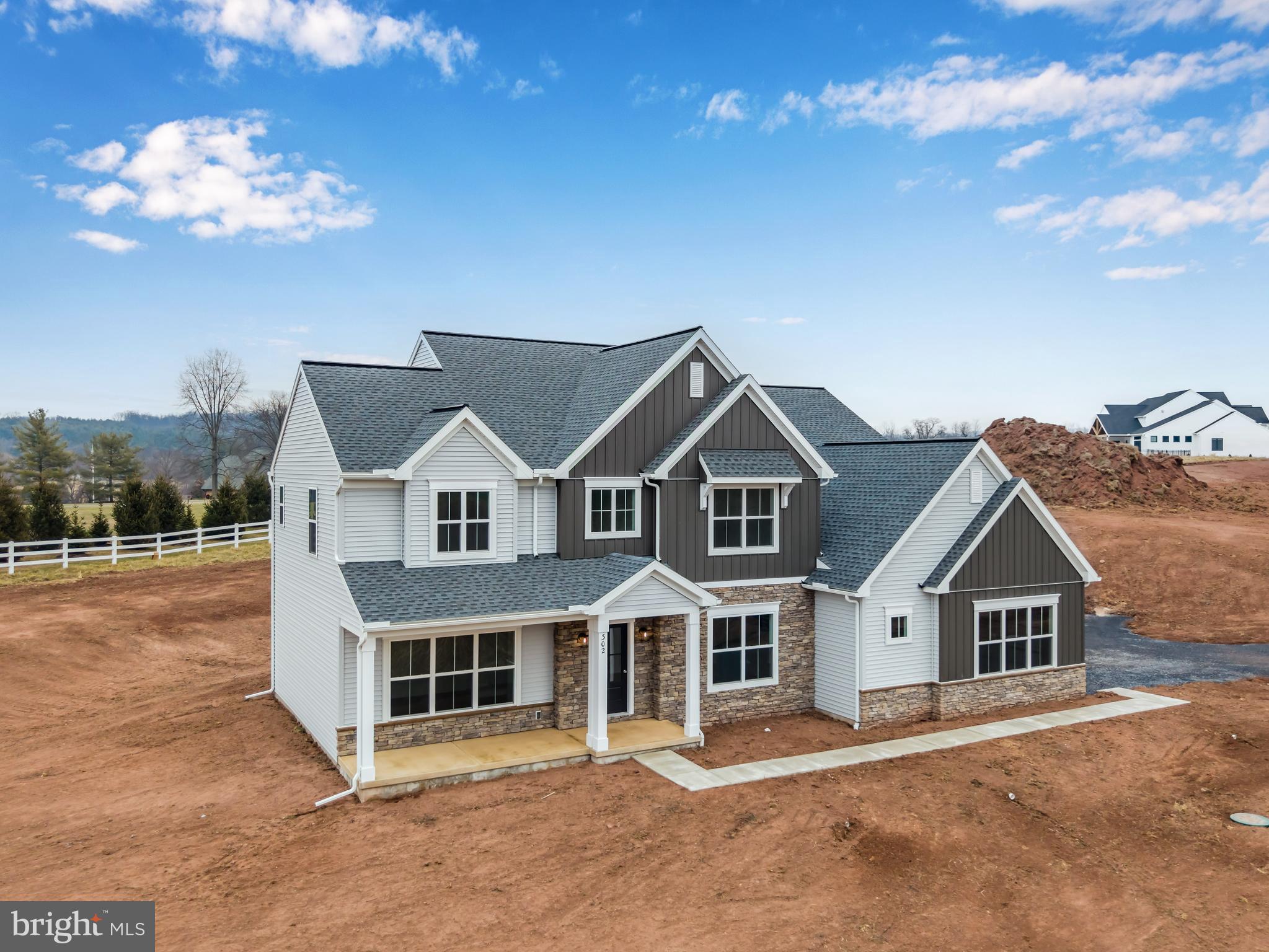 302 Cedar Road Dillsburg, PA 17019 - Photo 52 of 54 a front view of a house with a yard