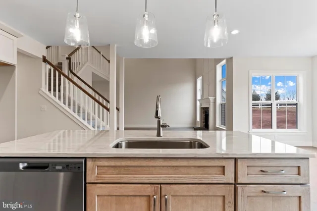 a view of a kitchen with cabinets