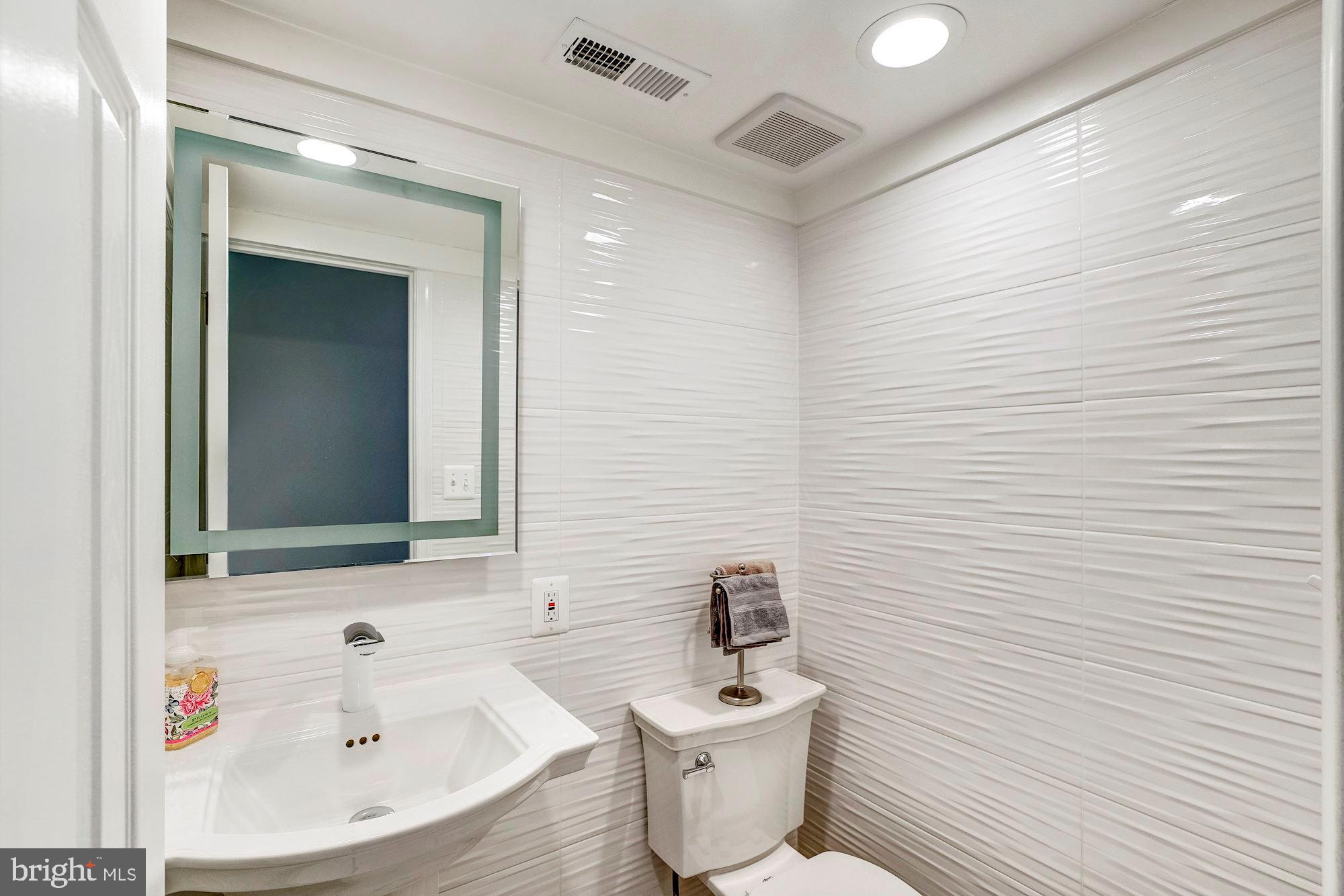7913 Foxhound Road McLean, VA 22102 - Photo 15 of 37 Renovated Half Bath