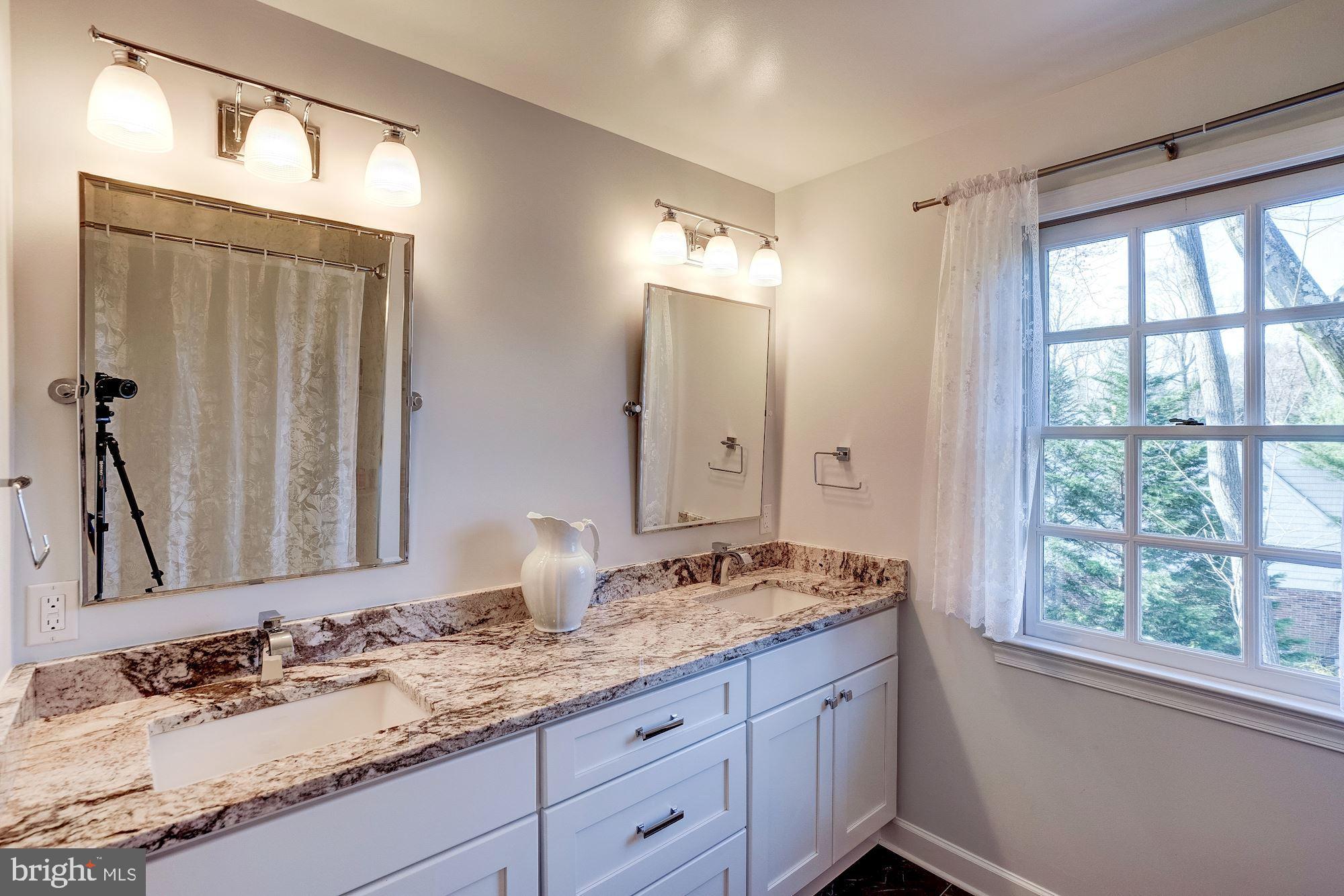 7913 Foxhound Road McLean, VA 22102 - Photo 24 of 37 Renovated Hall Bath
