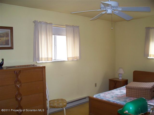 208 Tuthill Road Waymart, PA 18472 - Photo 5 of 6 a workspace with furniture and a window