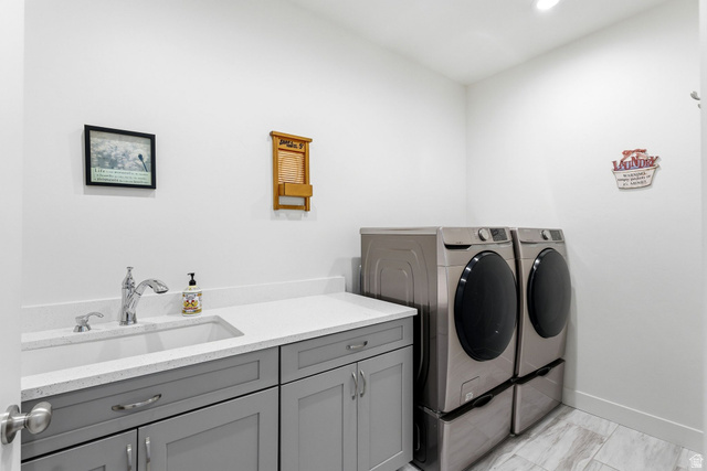 108 West Monte Rosa Lane Midway, UT 84049 - Photo 22 of 48 Laundry area featuring a utility sink, light gray cabinetry, white countertops, and wood-finish tile flooring